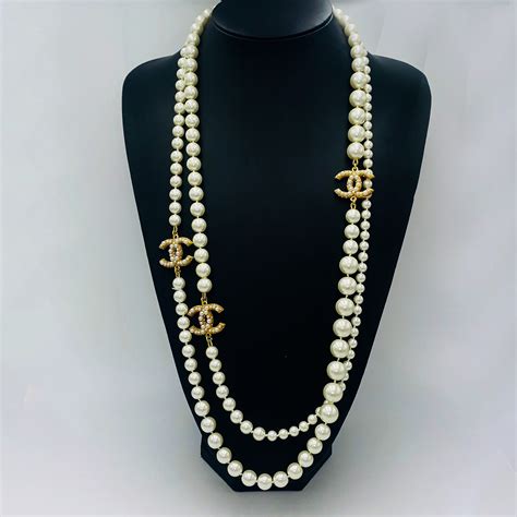 chanel necklace spelled out|Chanel long necklace with pearls.